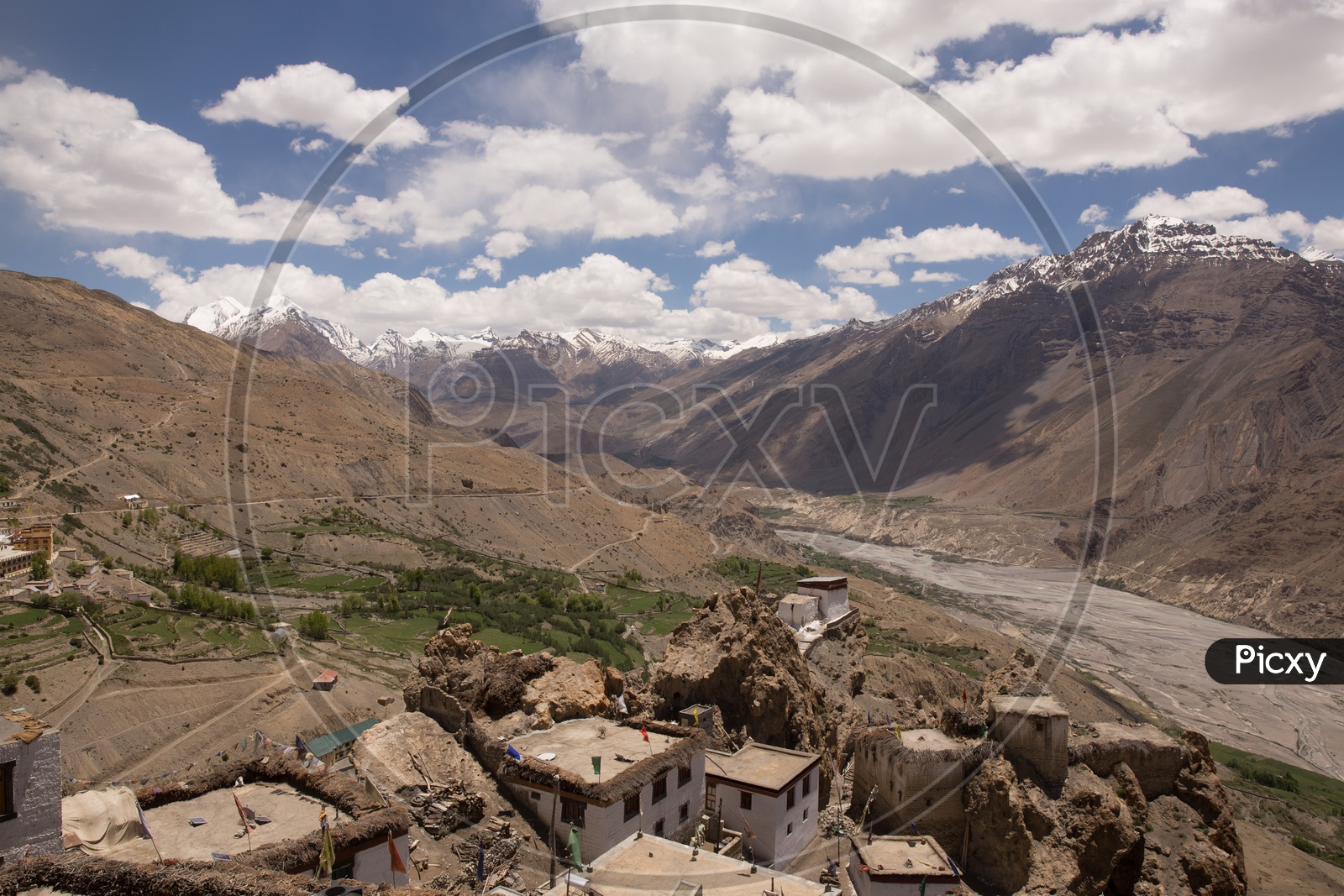 Landscape View Of Snow Capped Mountains And Sedimentary Hills From The Villages Of  Spiti Valley