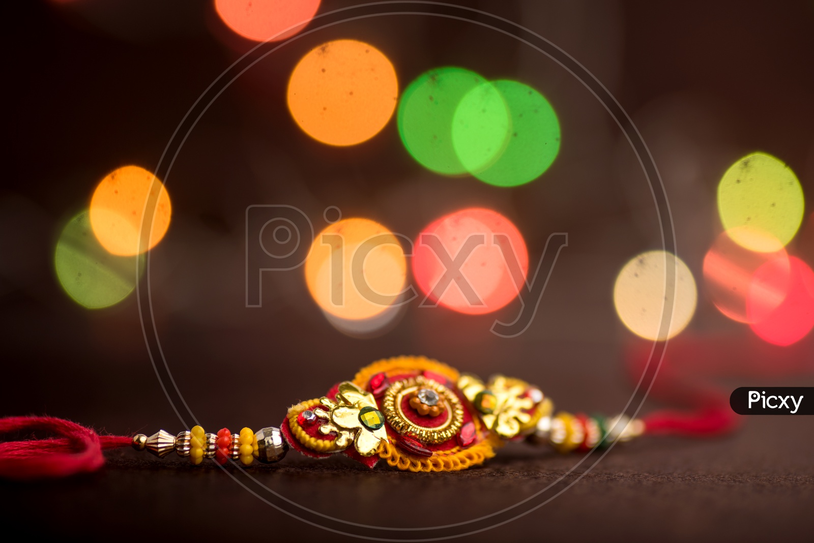 An Elegant Rakhi With an Led Bokeh Background