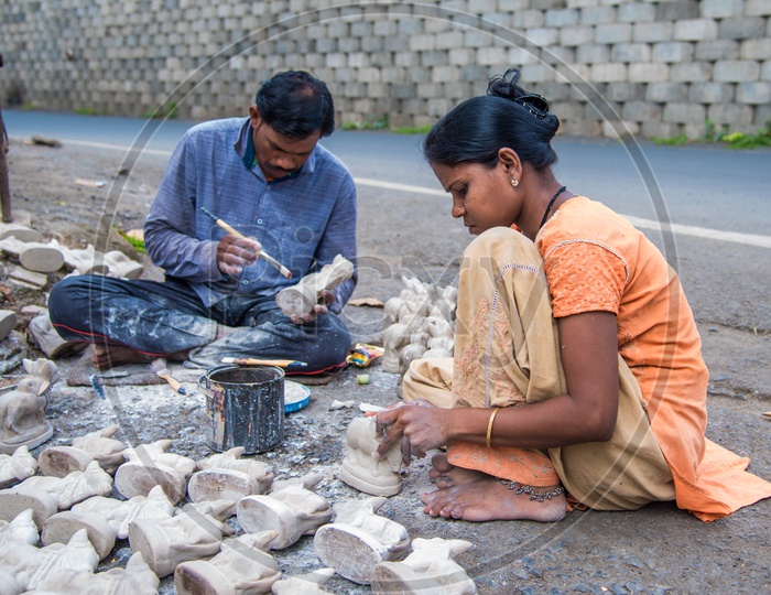 Artists Making Hindu  Holy Cows Idols in Workshops For Festivals