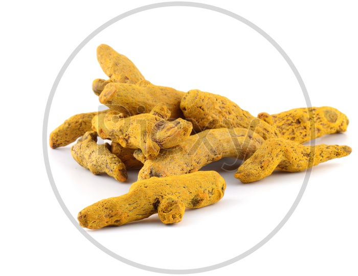 Dry Turmeric Roots or Barks on an Isolated White Background