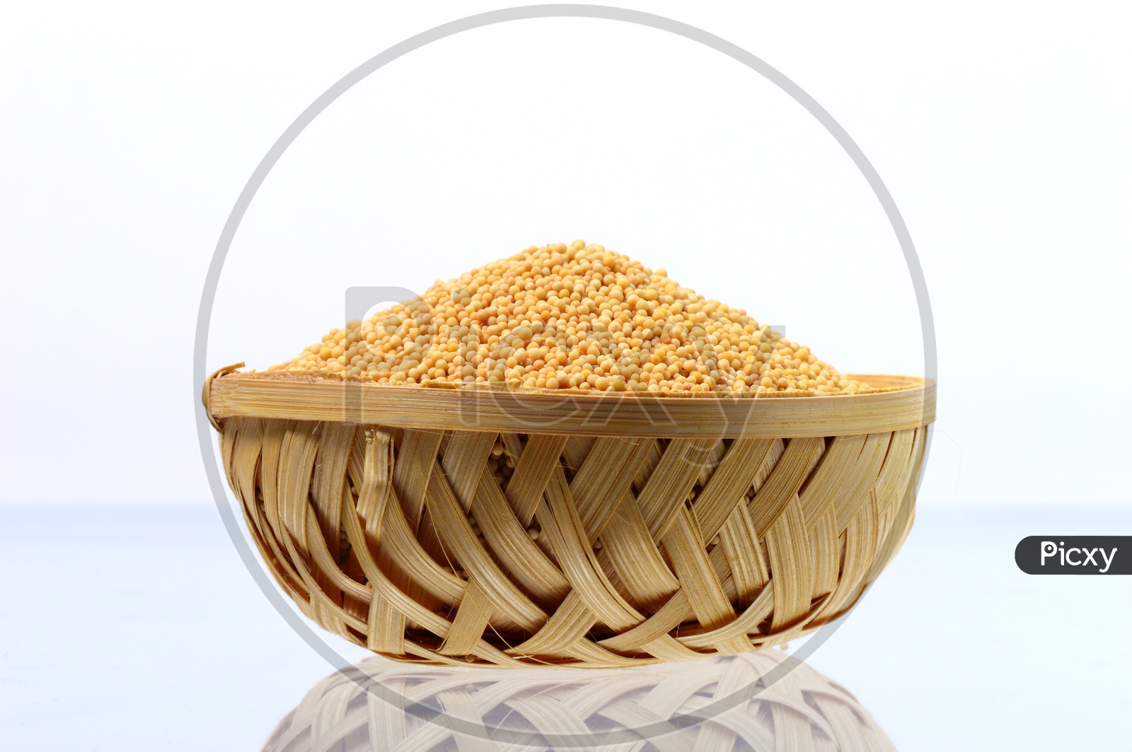 Image Of Yellow Mustard Seeds In Wooden Basket Isolated On White 
