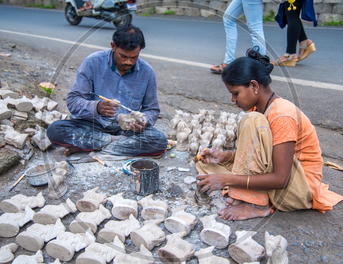 Artists Making Hindu  Holy Cows Idols in Workshops For Festivals