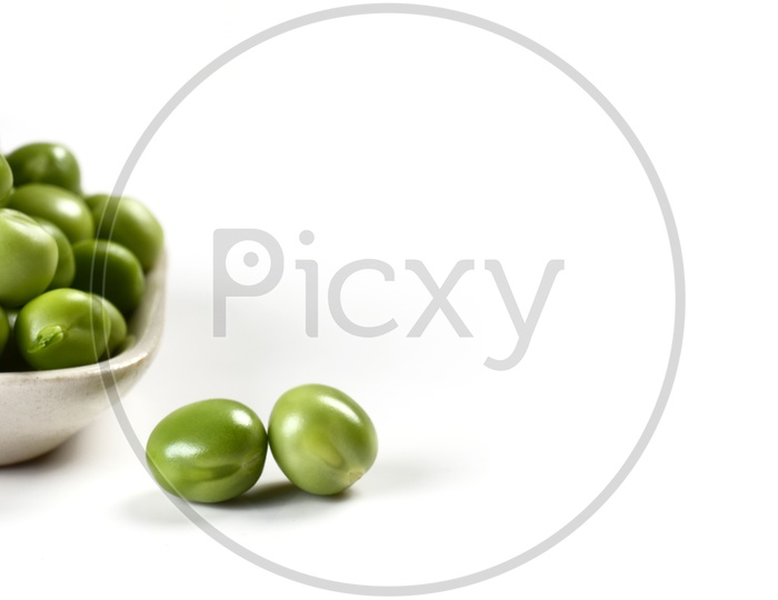 Fresh Green Pea in white plate on An Isolated white background