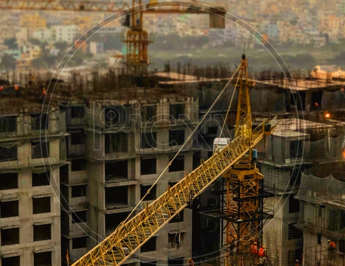 Heavy Cranes At a Construction Site