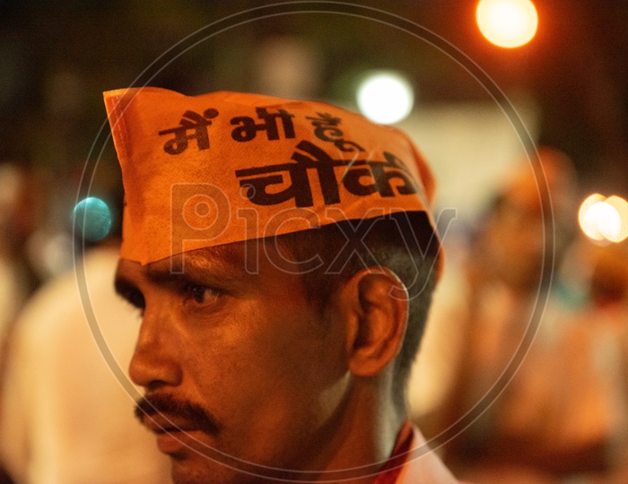 BJP Party Supporters Wearing The Party Caps At Election Campaign Rallies  Or At Party Meeting