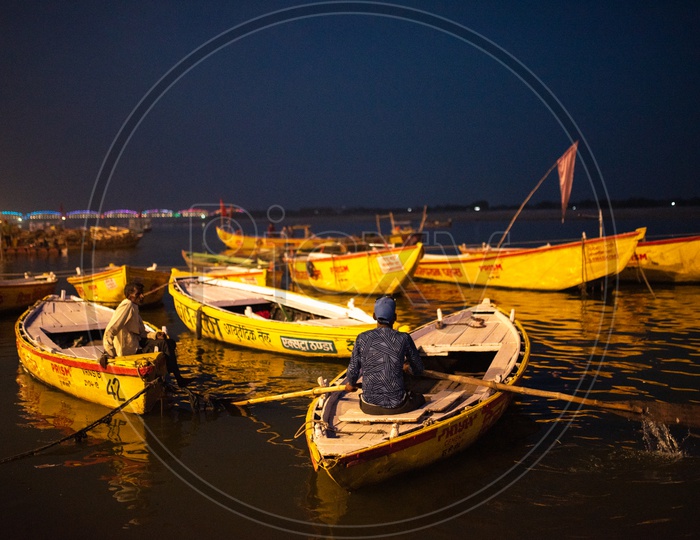 A Boat Rider Or Helmsman  on His Boat at The Ghats Of  Varanasi