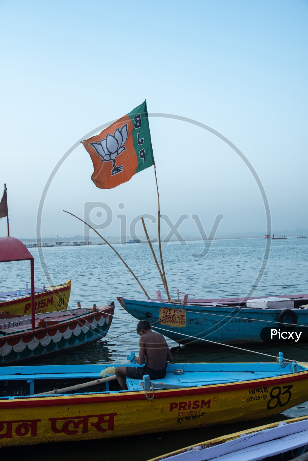 BJP Party Flags Tagged  to Commuting Boats   at Ghats In Varanasi