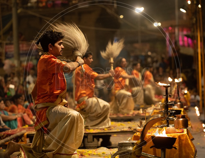 Priests Performing Ganga Aarti Or Ganga Haarati   For Sacred River Ganga  in Varanasi