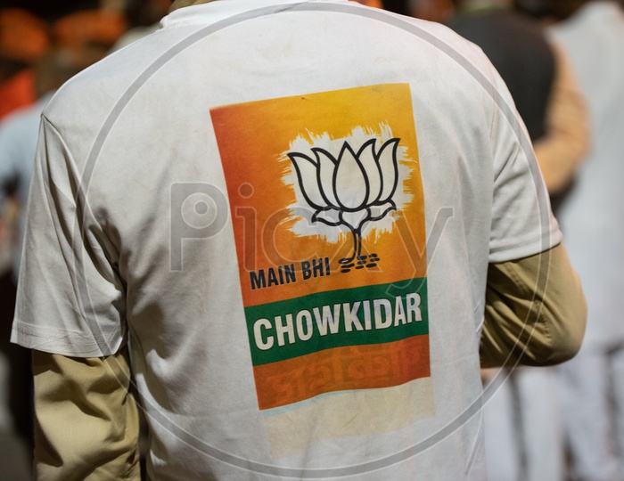 BJP Party Workers Or Supporters  Wearing Main Bhi Chowkidar  TShirts  During Election Campaigns Or  Party Meetings