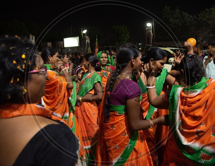 BJP Party Workers Or Supporters  or Karyakathas  Wearing The BJP Saris Or Sarees  During The Election Campaign Or  Party meetings