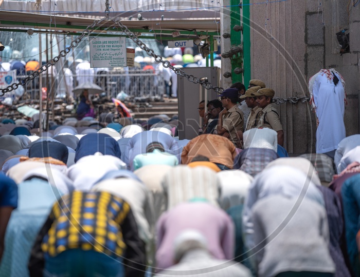 Muslims Doing Namaz  or Prayers As  A  Group  in Ramzan Or Ramadan At Mecca Masjidh or Mosque at Charminar