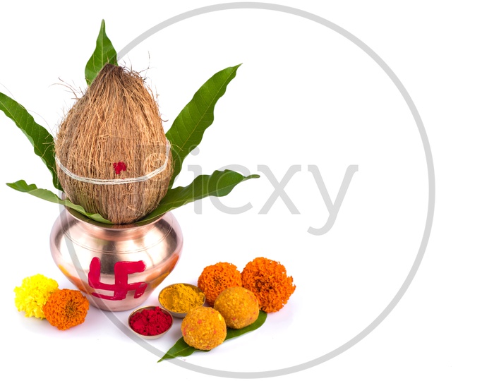 Indian Hindu Pooja Kalash With Flowers And Sweets for Festivals And Worshipping Hindu Gods