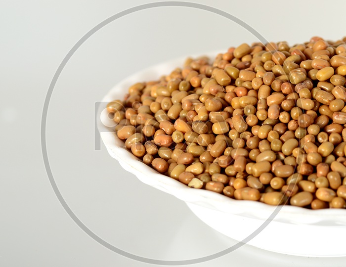 Moth Bean or Dew Bean or Legume Or Turkish Gram Or Mat Bean Or Alasandhalu   in a Bowl On an Isolated White Background