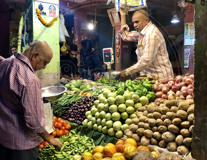A Vegetable Vendor in the Farmer's Market