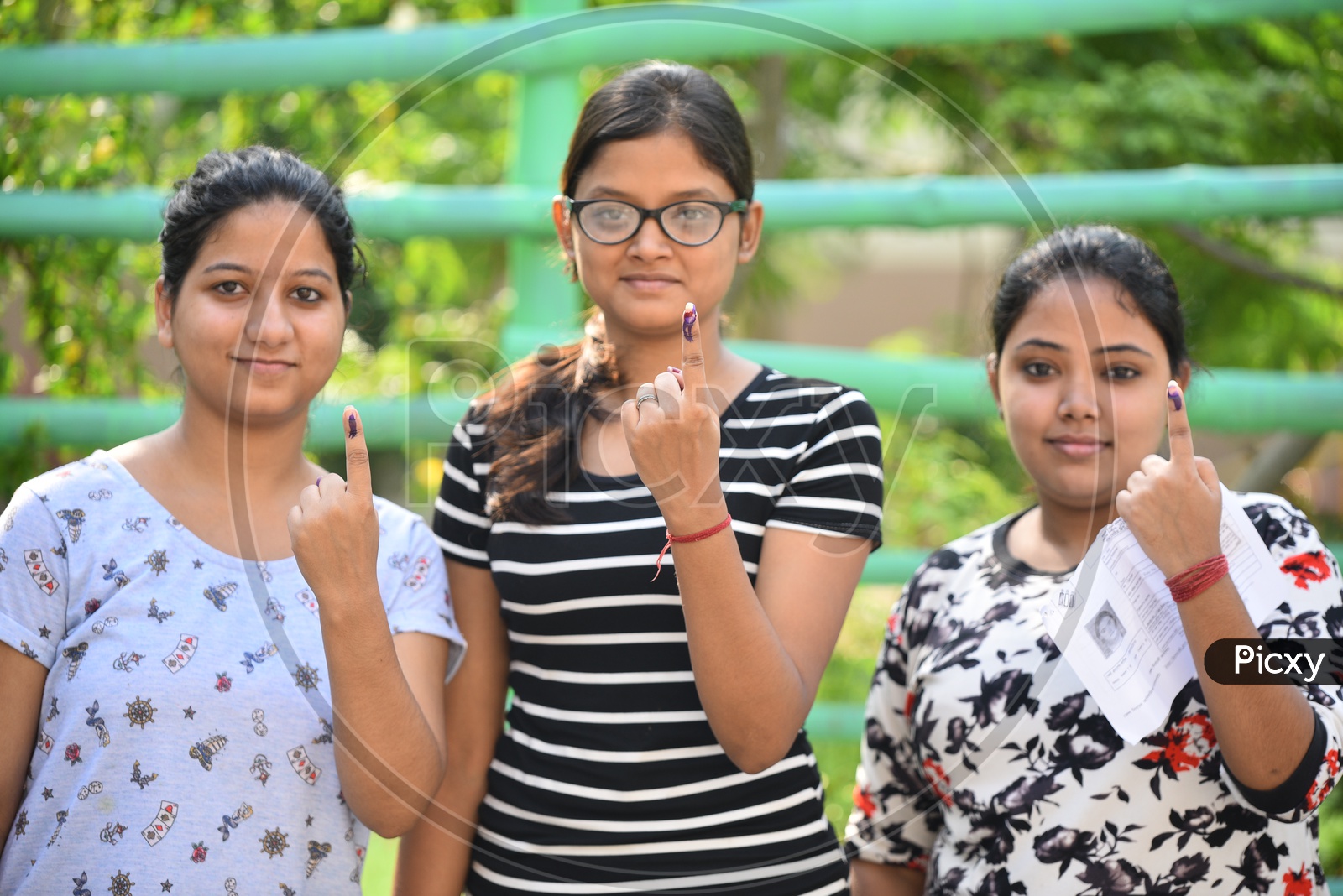 A Young Indian Girls  Showing Inked Finger After Casting Their  Vote in General Elections 2019 in West Bengal