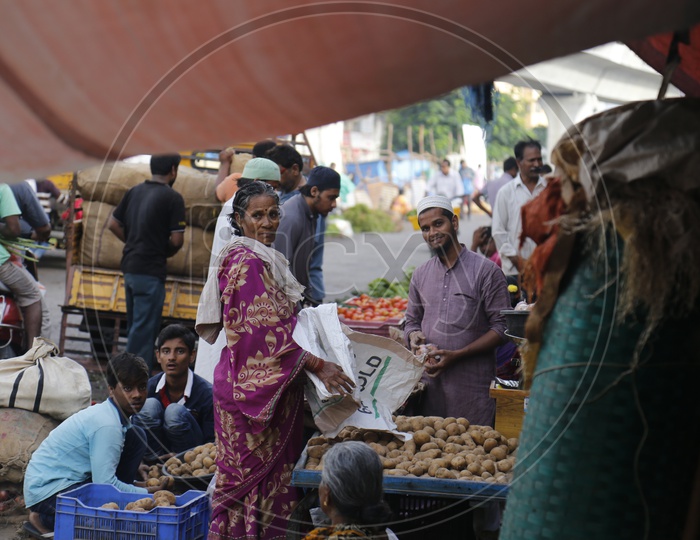 vendor at vegetable market