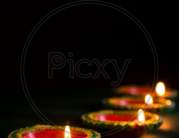 Indian Traditional Lights Festival Diwali Diyas  Presentation On an Isolated Background For Diwali Festival  Wishes  Template