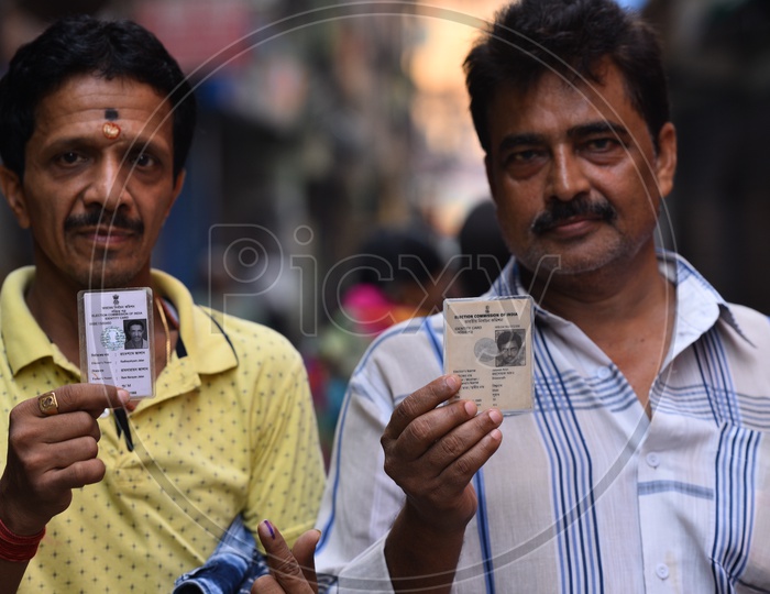 Voters Showing Their Inked Fingers And Voter ID or EPIC Voter Cards After Casting Their Votes  In  General Elections 2019  in West Bengal