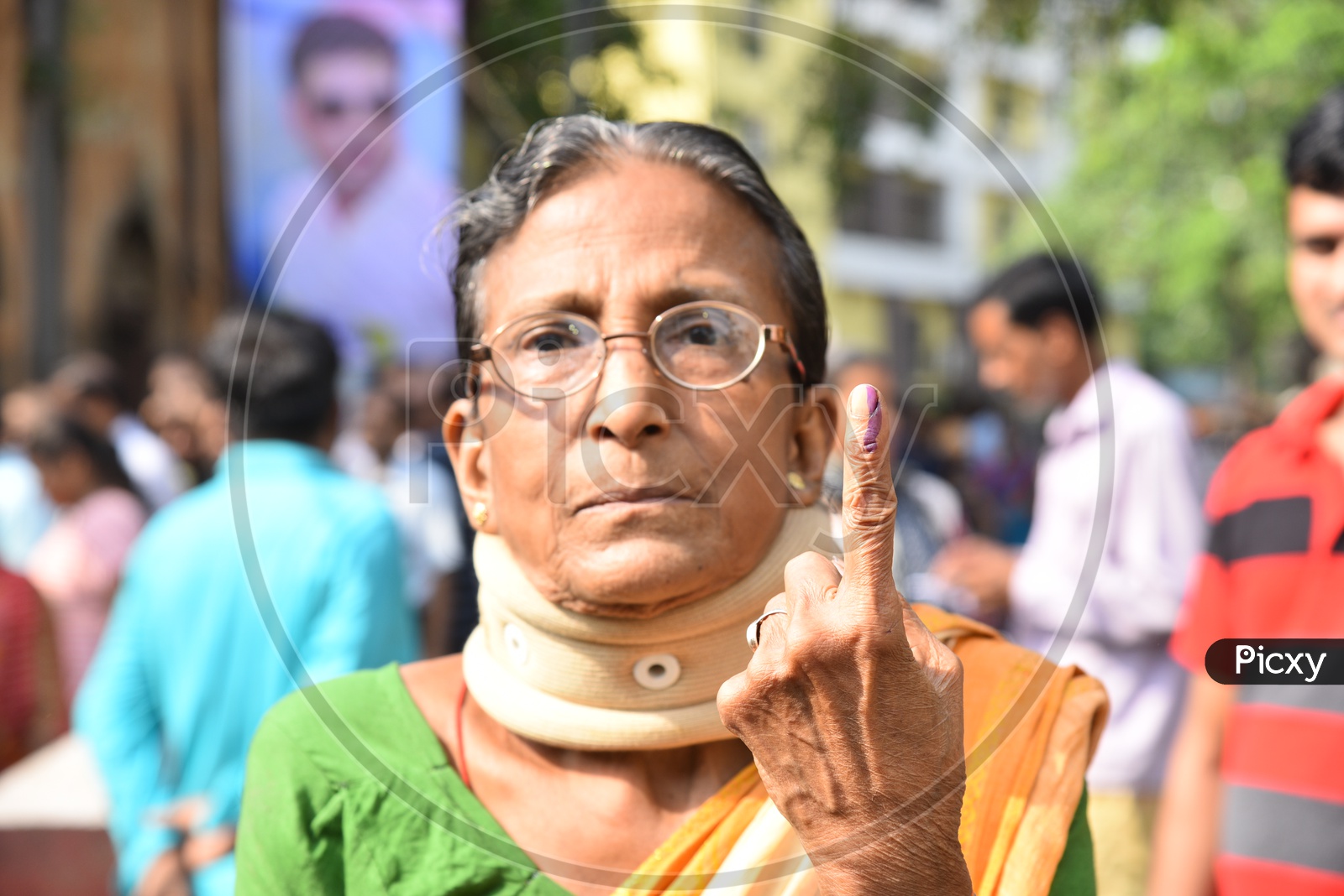 An Indian Woman Showing Inked Finger After Casting Her Vote In  Lok Sabha  General Election  2019  in West Bengal