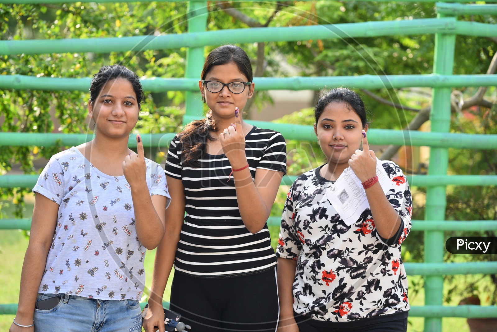 A Young Indian Girls  Showing Inked Finger After Casting their  Vote in General Elections 2019 in West Bengal