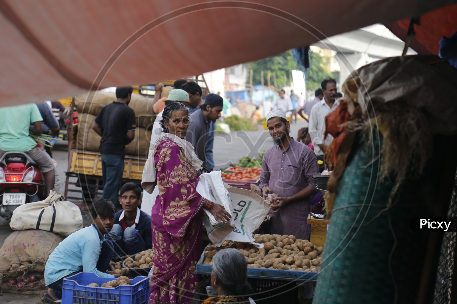 vendor at vegetable market