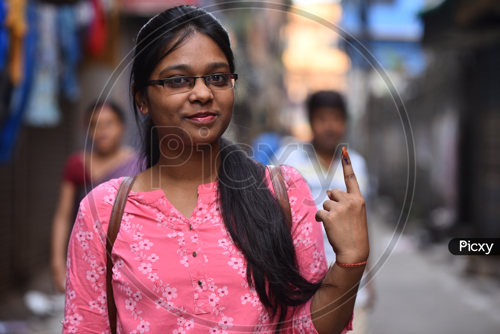 A Young Indian Girl Showing Inked Finger After Casting Her Vote in General Elections 2019 in West Bengal