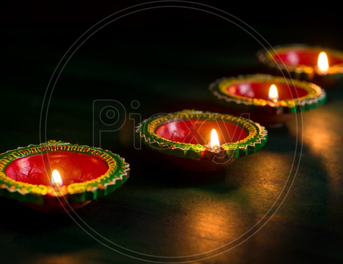 Indian Traditional Lights Festival Diwali Diyas  Presentation On an Isolated Background For Diwali Festival  Wishes  Template