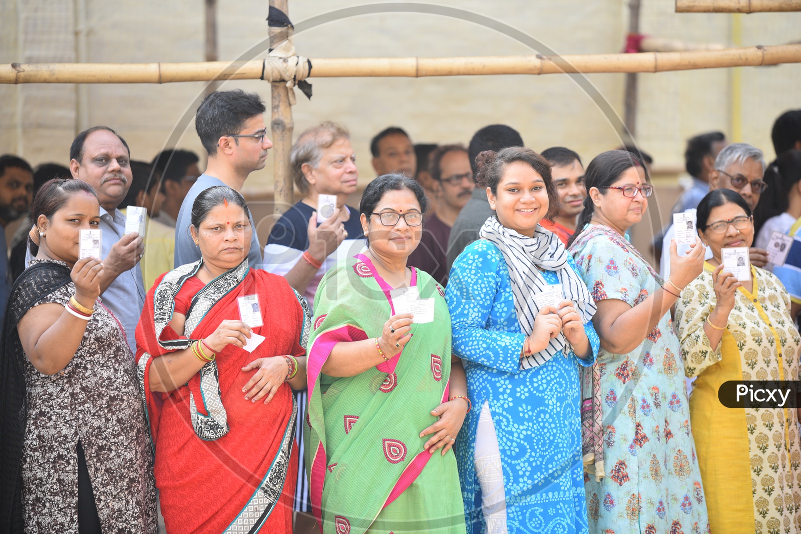 Indian Woman In Queue Lines At Polling Booth In West Bengal For Casting Their Votes In Parliament General Elections 2019