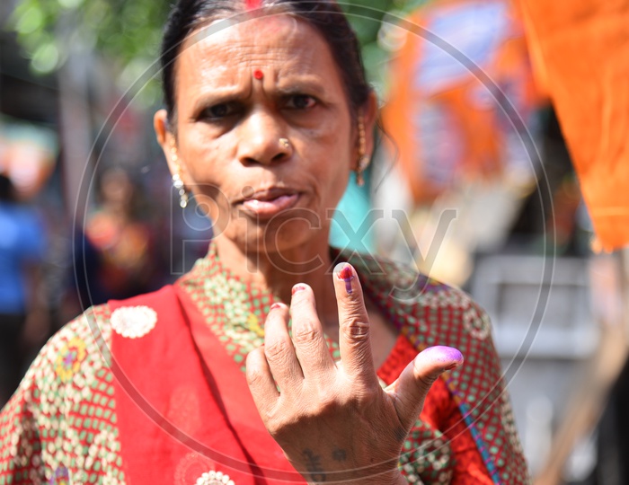 An Indian Woman Showing Inked Finger After Casting Her Vote In Lok Sabha  General Election  2019  in West Bengal