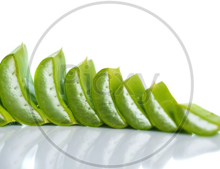 Sliced Aloe Vera Pieces on an Isolated White Background