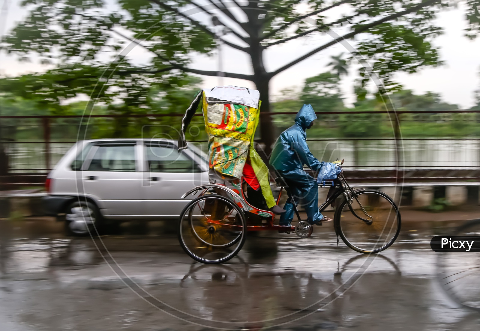 A rickshaw wala during Cyclone fani
