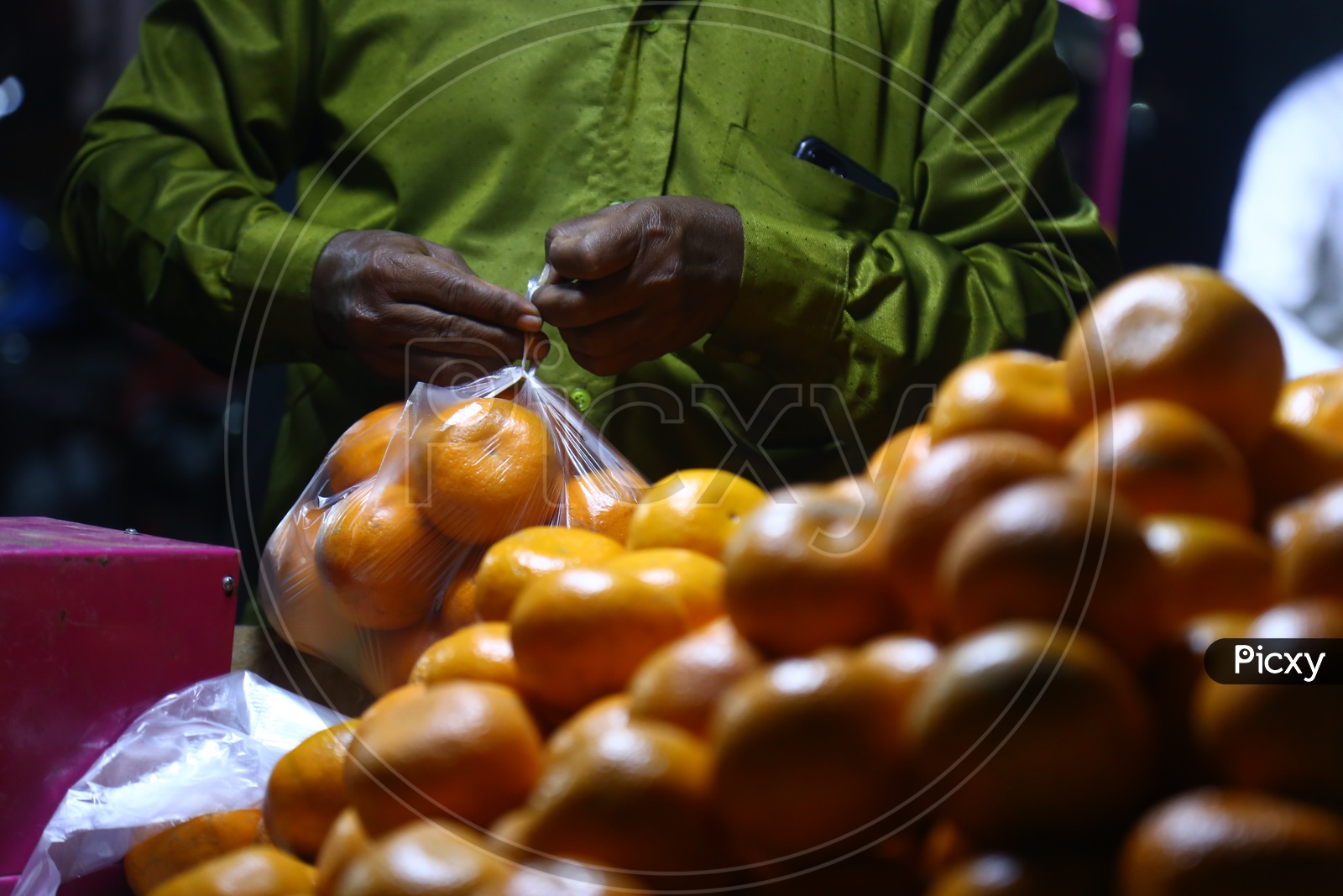 Fruit Seller in Night Market
