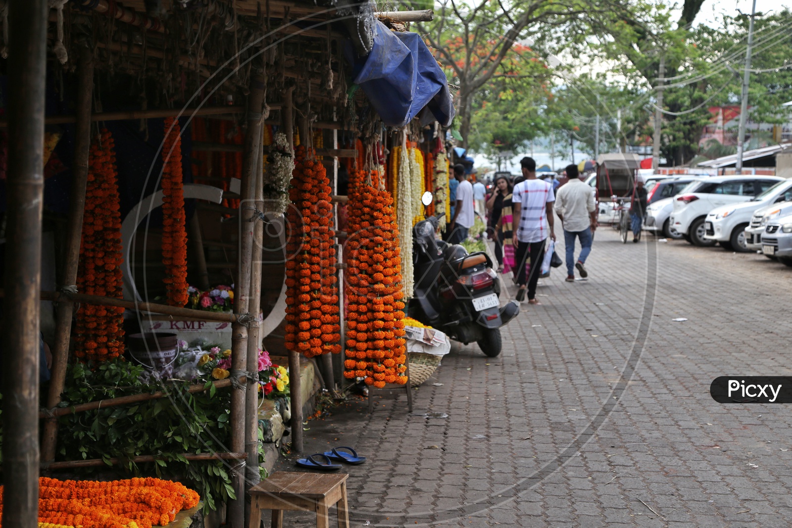 Garlands With  Fresh Flowers  In The Vendor Stalls