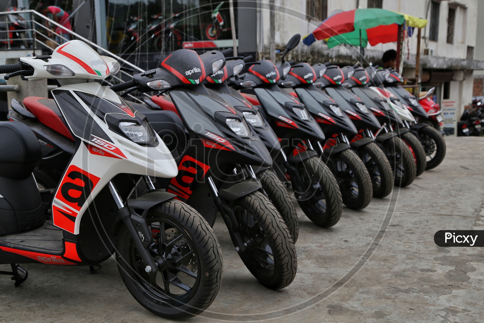 Yamaha Aprilla  Scooty or Mopeds   Parked At a Showroom