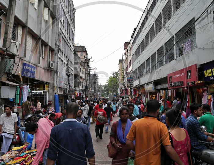 A Busy Fancy Bazaar With Clothes Stores And  Shoppers