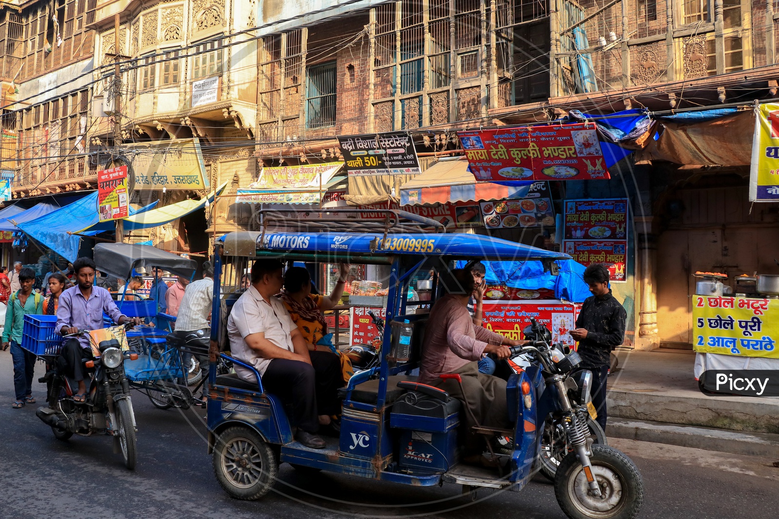 Electric auto rickshaw in the streets of Haridwar