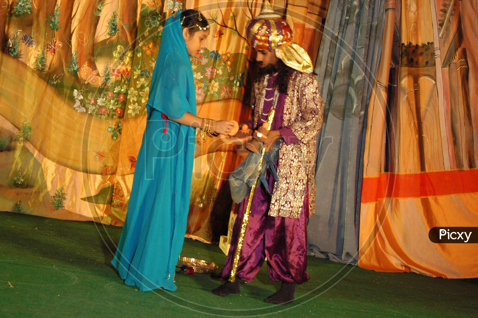 image-of-children-or-school-students-performing-on-stage-wearing-fancy