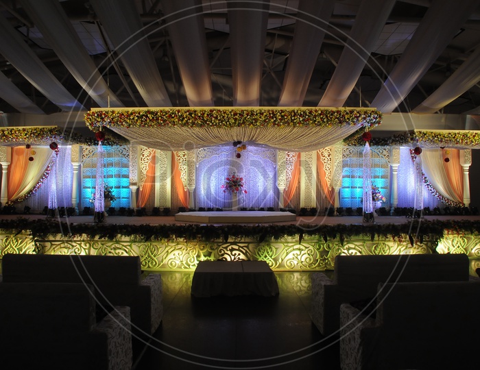 Decorated Stage With  Fresh Flowers And led Lights  in a Convection Center
