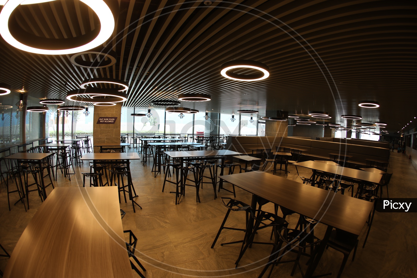 Cafeteria With Interior Chairs And Tables