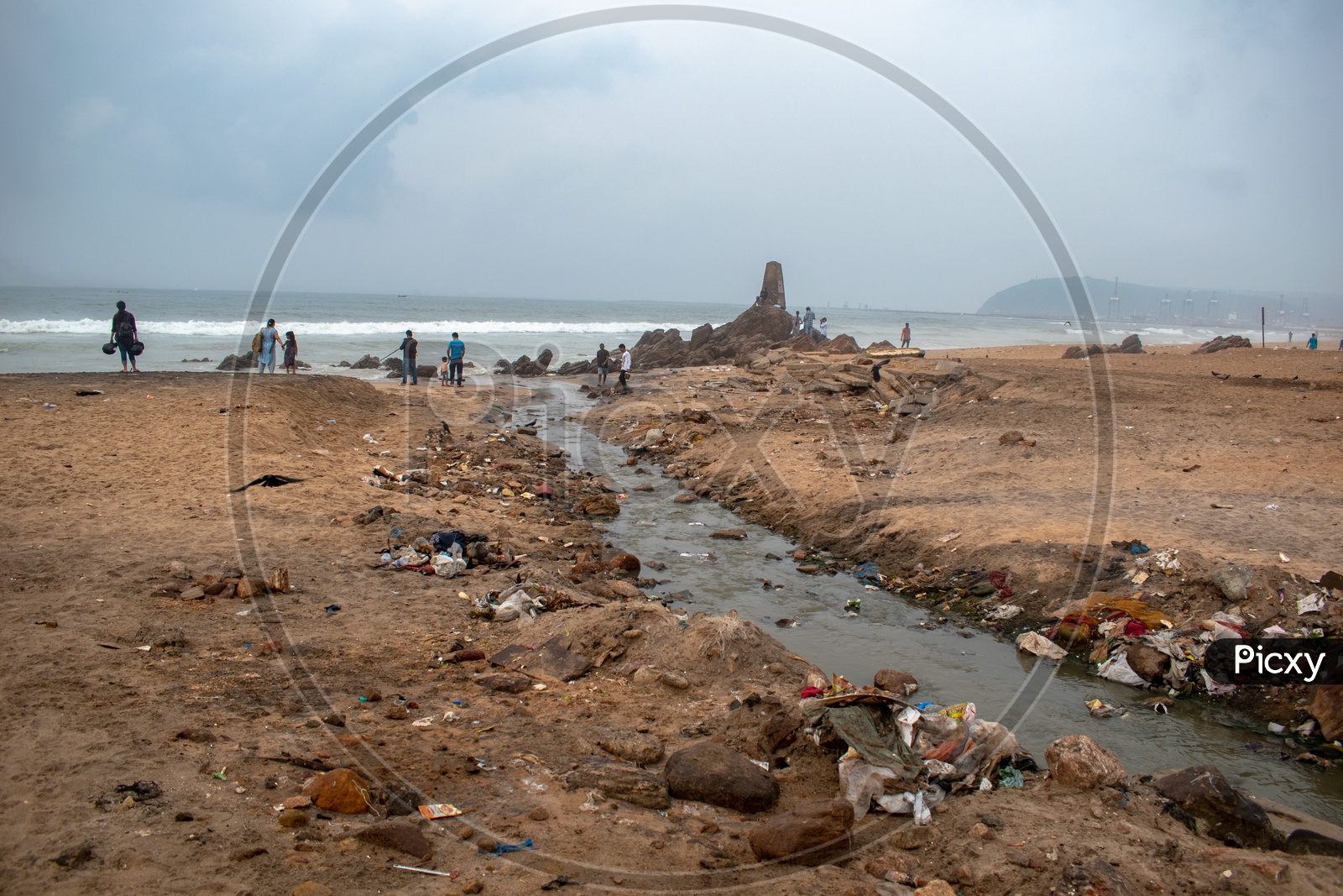 Drainage water from nearby buildings getting mixed into R K Beach, Visakhapatnam, Andhra Pradesh