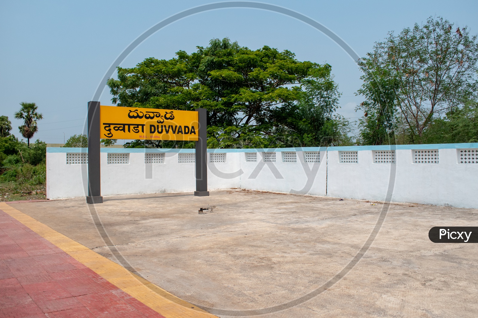 Indian railways sign board showing the name of Duvvada station,Andhra Pradesh.