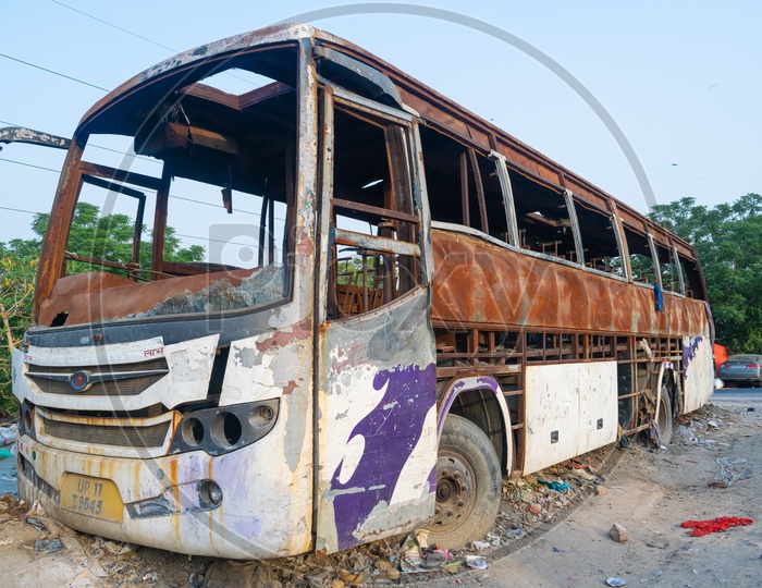 An old damaged and rusted bus