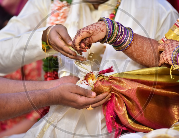 Rituals in Telugu Weddings Or Marriages With Hands Closeup