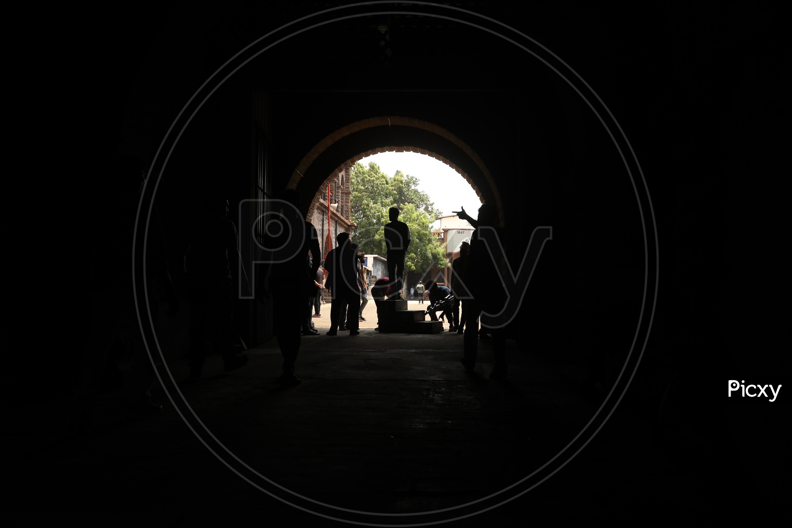 Silhouette Of People In a Corridor