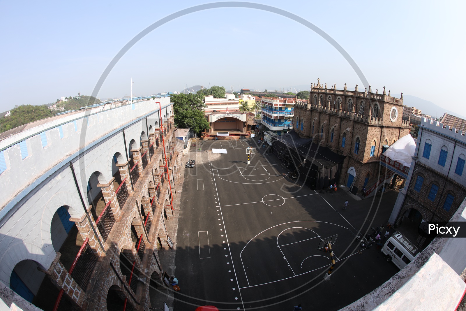 Image of Aerial View Of a Basketball Court In a School Compound