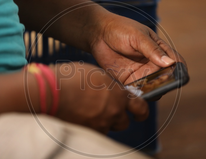 A Man Using Smartphone Hands Closeup