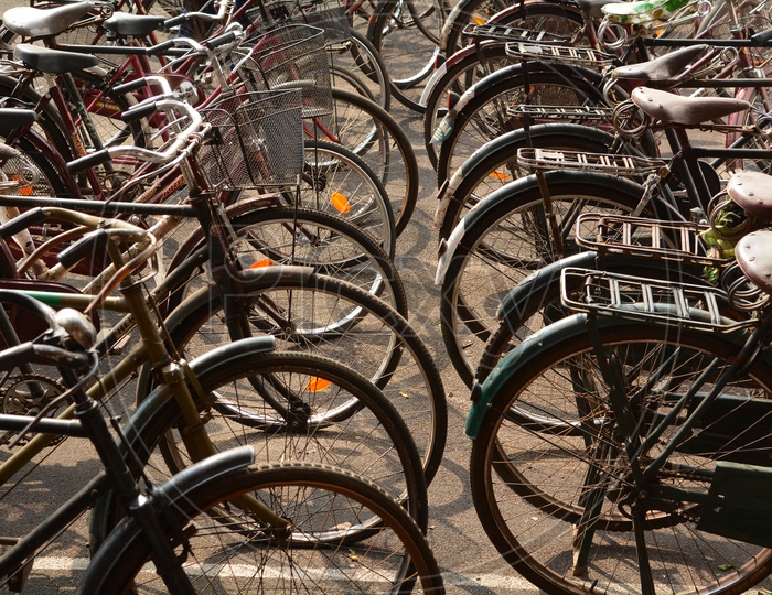 Bicycles Or Cycles Parked In a Row