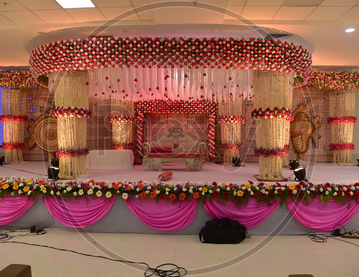 Decoration Of a Wedding Stage With Fresh Flowers And Led Lights