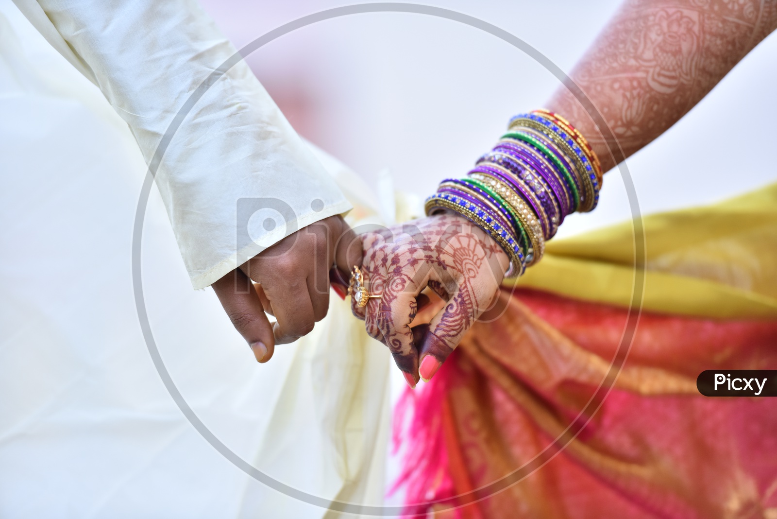 Bride And Groom Holding Hands In a Wedding  or Marriage