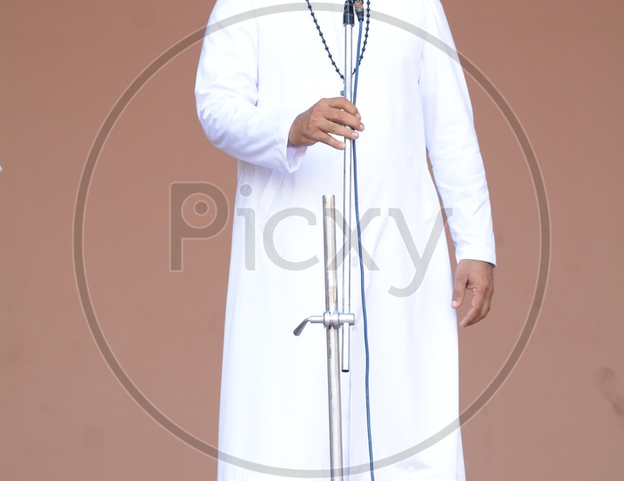 Image of A Church Father or Christian School Principal Speaking In a  Assembly Meet in a School-OY083494-Picxy